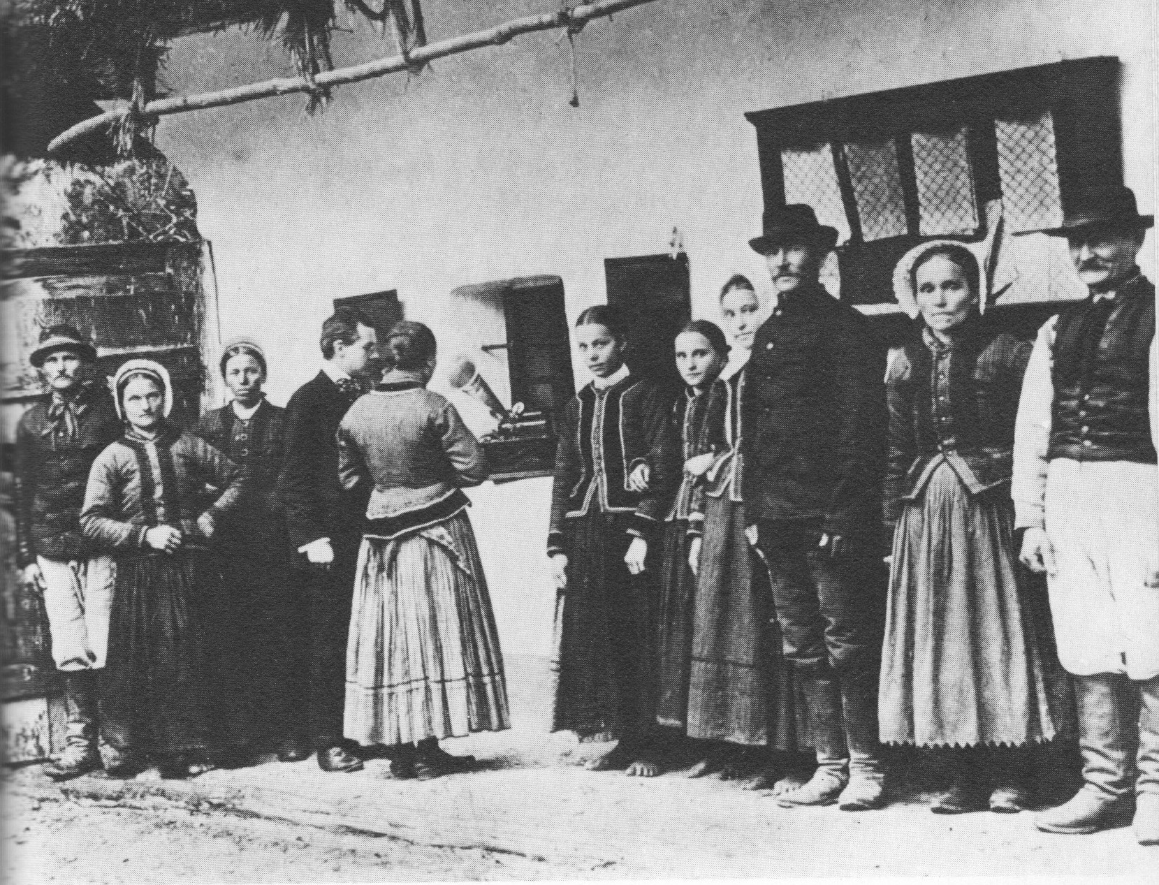What is a folk song? Bela Bartok using a gramaphone to record folk songs sung by Slovak peasants.